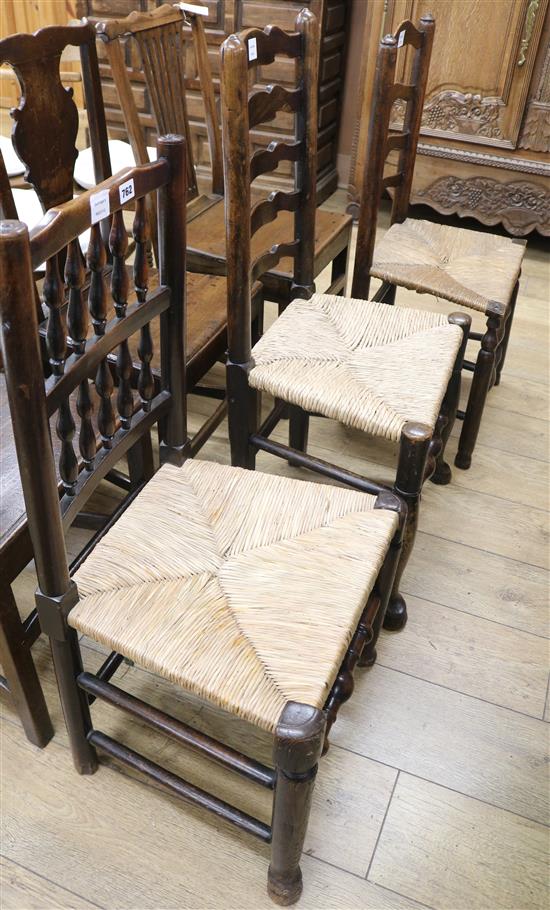 Two rush seated ladderback dining chairs and a spindle back chair (3)